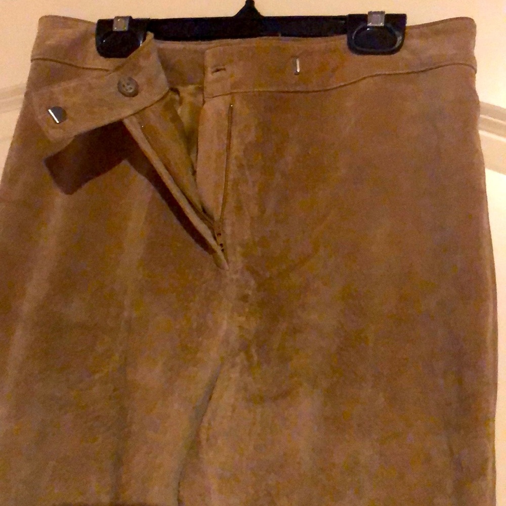 100%Suede, straight legs, polyester lining. Used